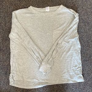 Matching grey pajama/lounge set. Size M top, size L pants.